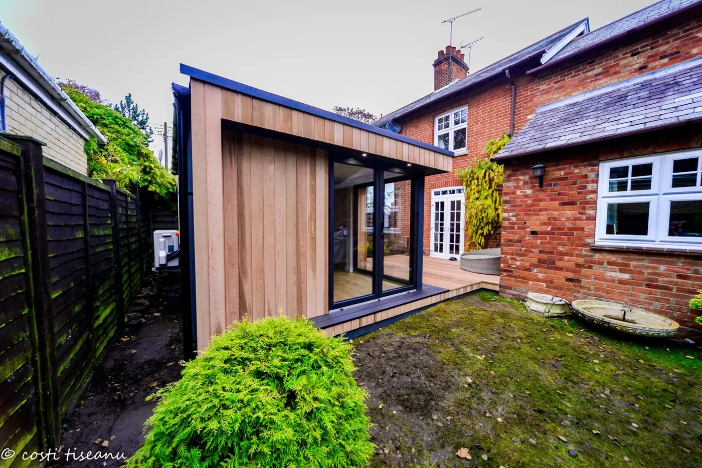 Cedar-clad garden piano room beside the house in Waltham Saint Lawrence