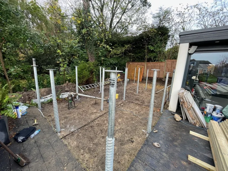 Screw piles installed for a TRJ garden building foundation