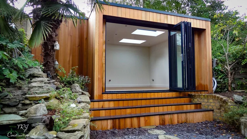 Garden studio with wide folding doors