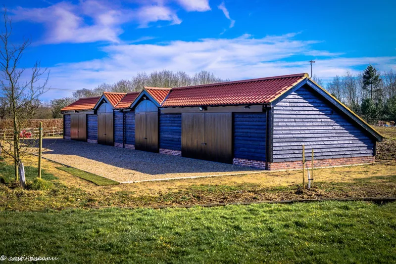 Finished pitched-roof annexe with grey external cladding