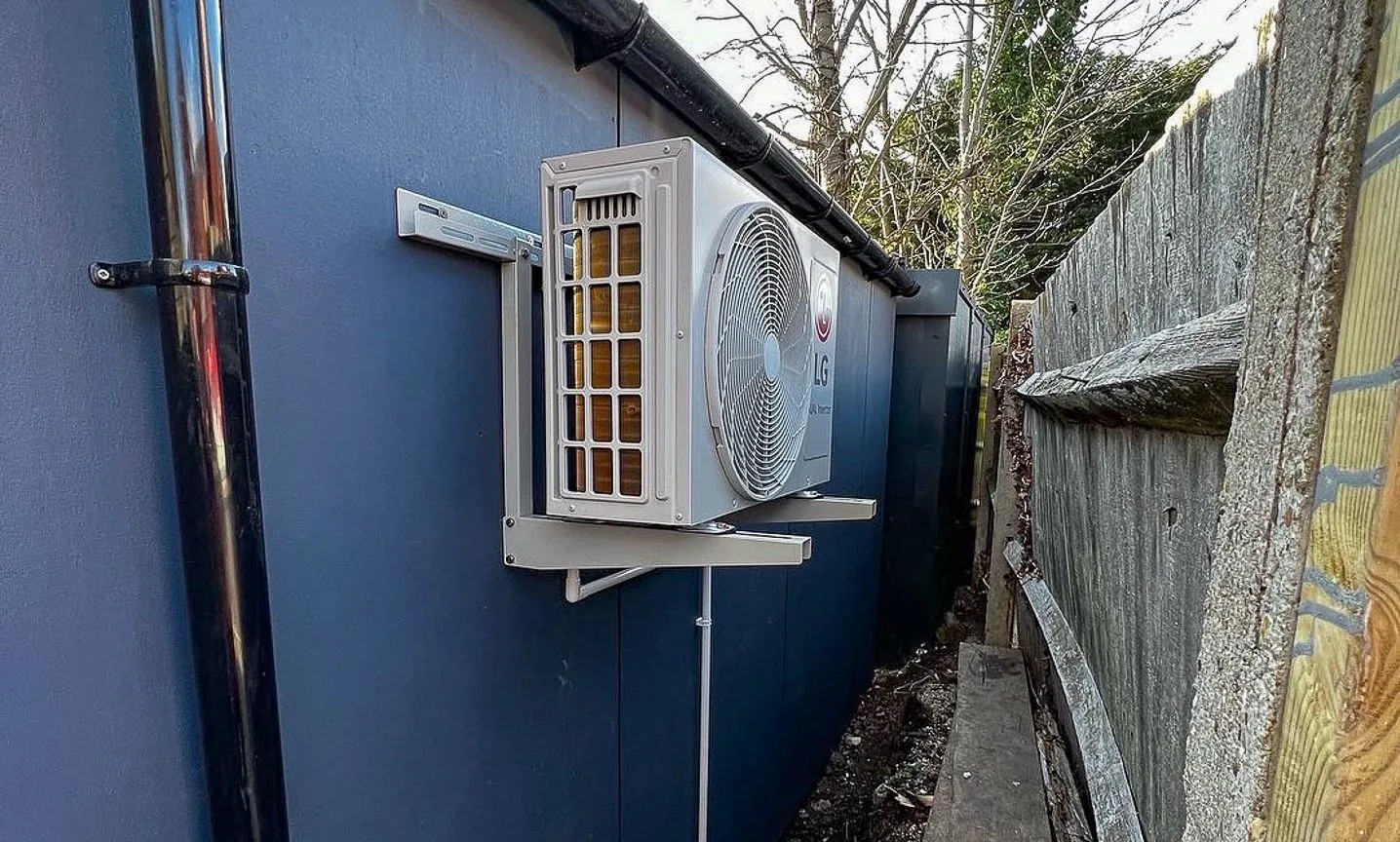 Outdoor air-conditioning unit installed beside a TRJ building