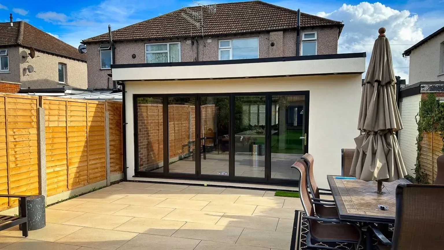 Completed TRJ house extension with glazed garden doors