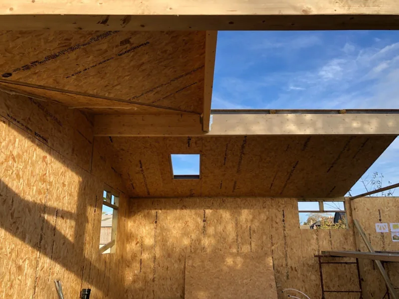 SIP roof panels and rooflight openings seen from inside