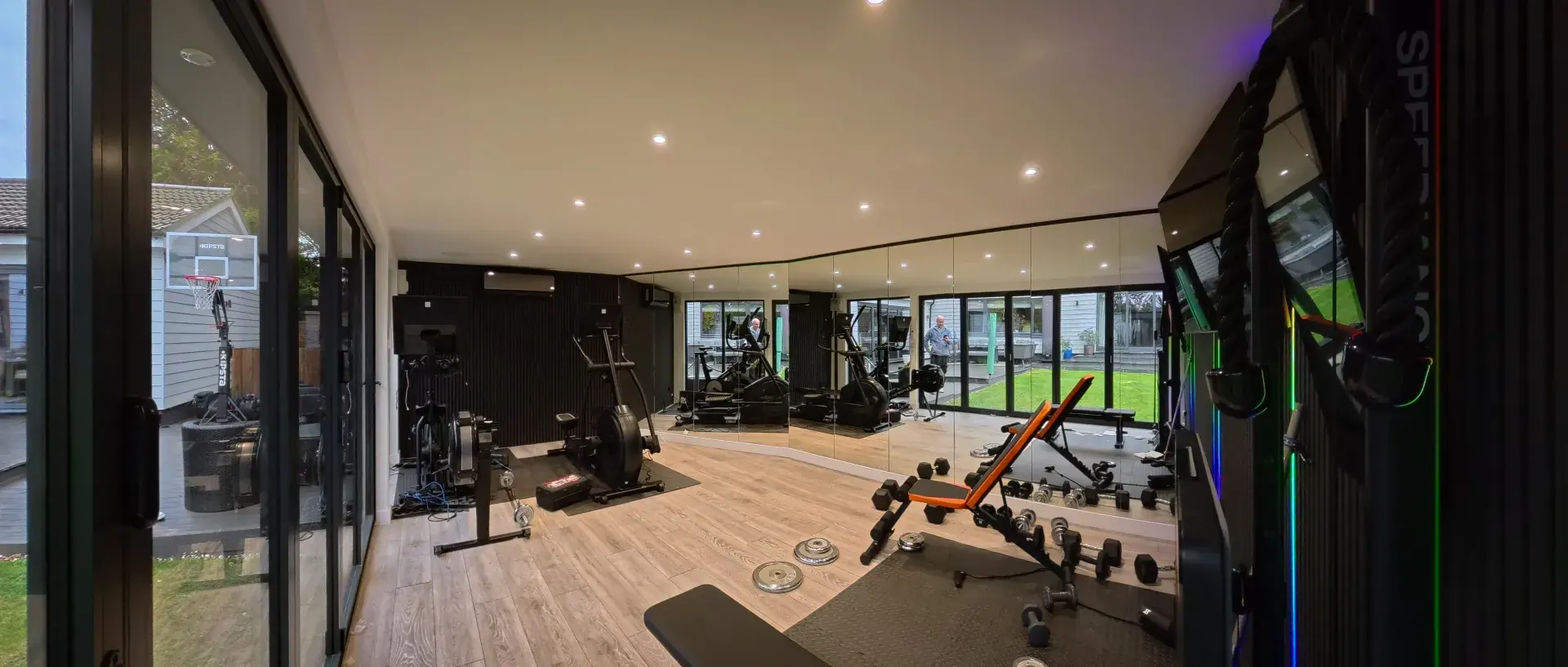 Garden gym interior with treadmill and exercise equipment