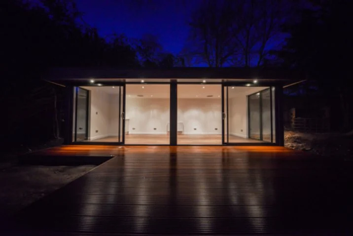Garden art studio illuminated at night — Guildford, Surrey
