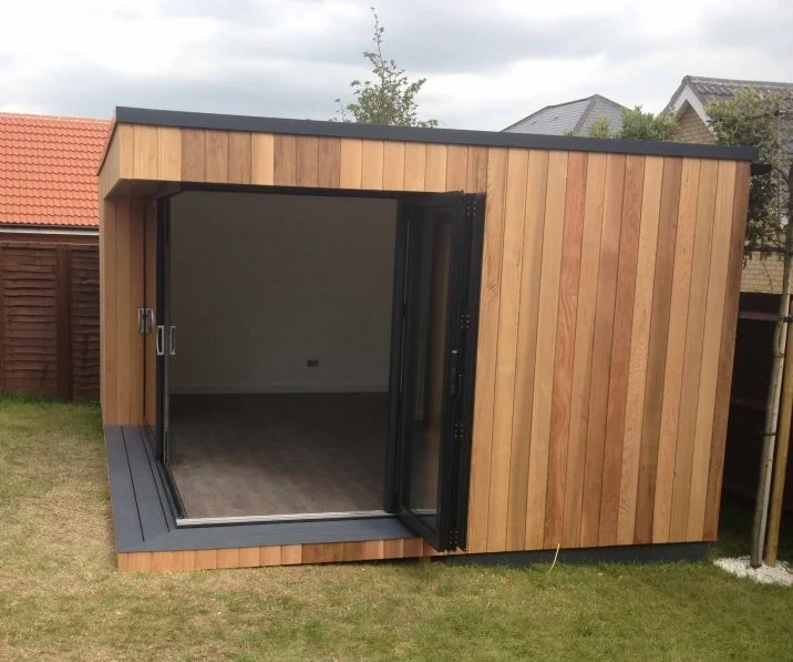 Open doors at the cantilevered corner — Laindon, Essex