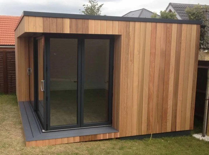 Sliding glazing and cedar facade — Laindon, Essex