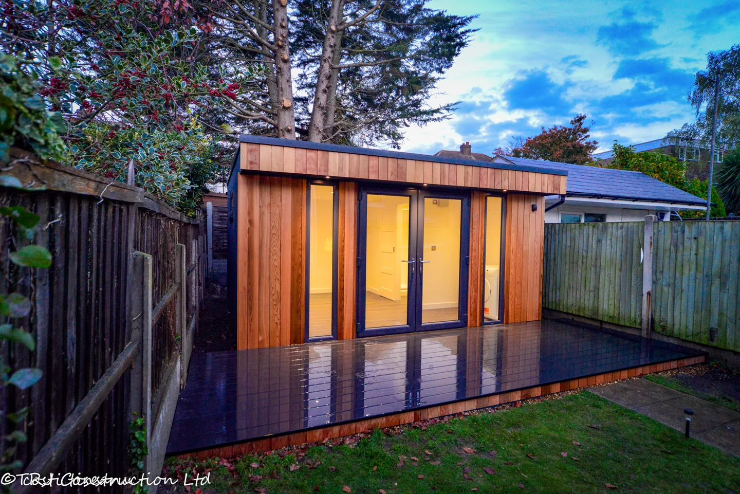 Illuminated garden room with ensuite shower room and glazed double doors