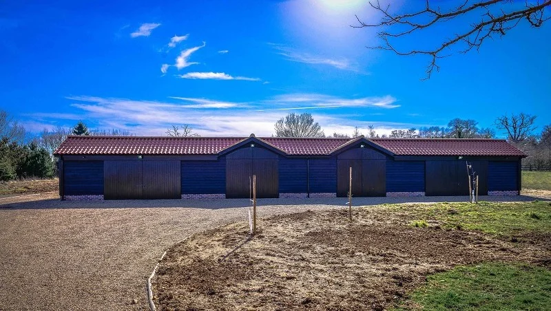 Barn viewed across the site — Hertfordshire