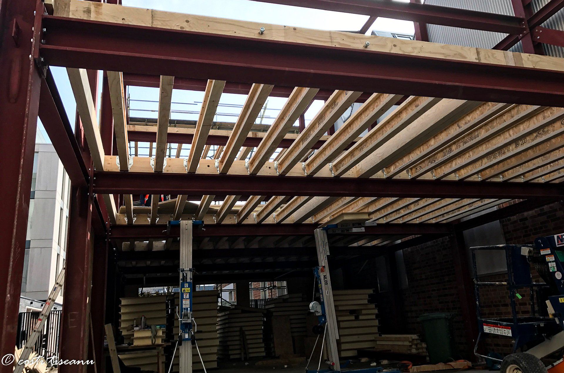 Structural steel beams and floor framing during commercial construction