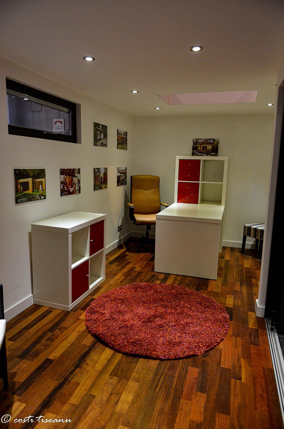 Garden-room display interior with seating and flooring