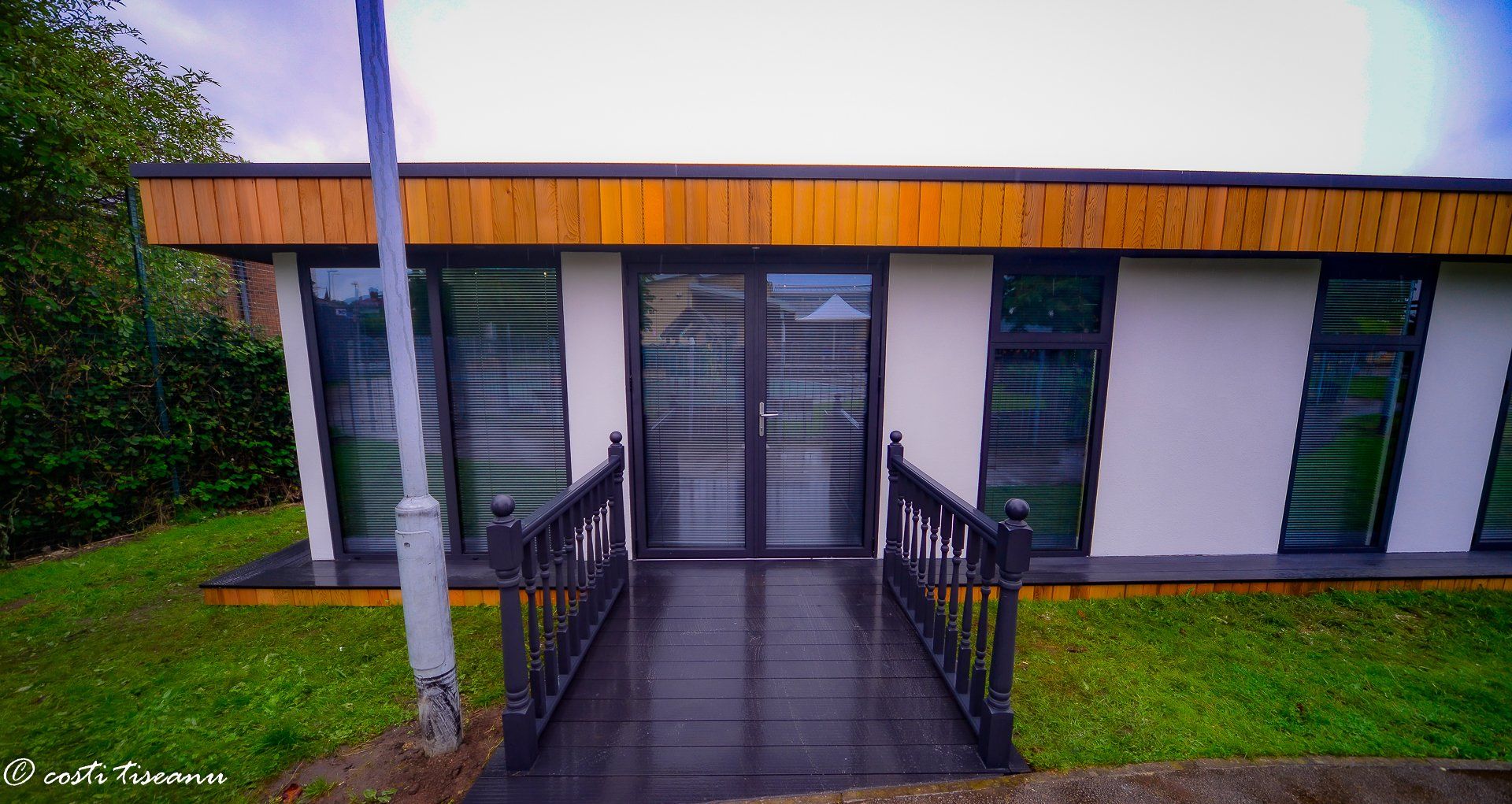 Entrance ramp and railings outside a school building