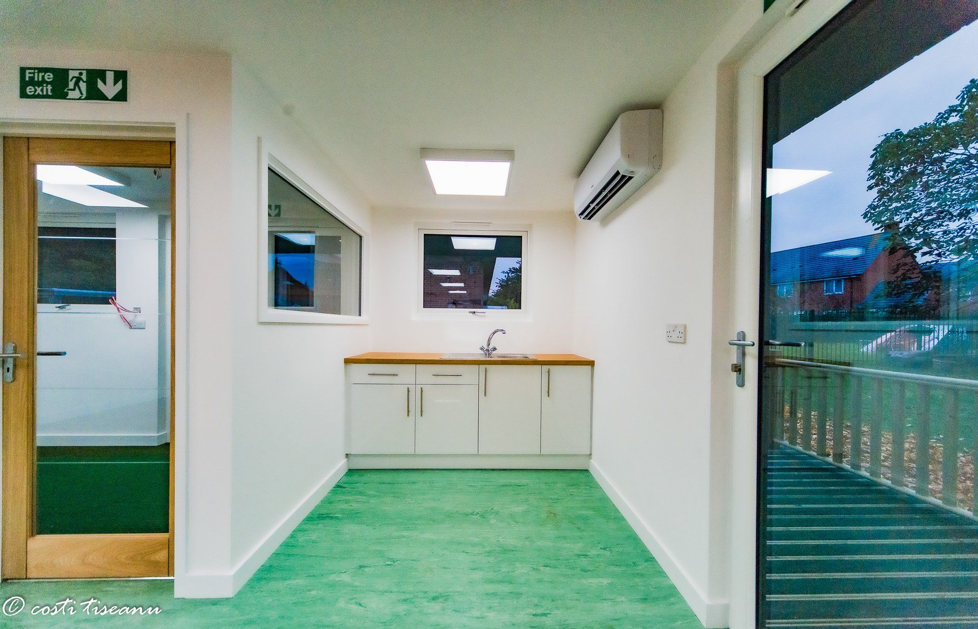 School kitchenette and glazed door overlooking the grounds