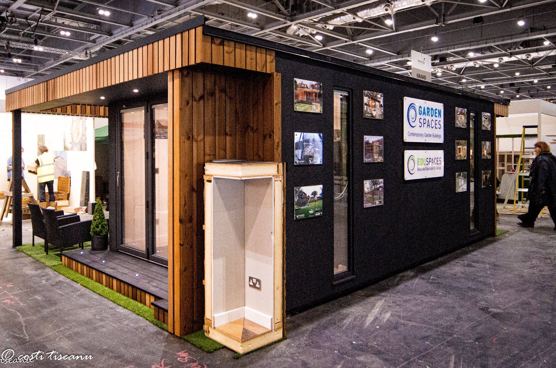Side of an exhibition building with project information panels