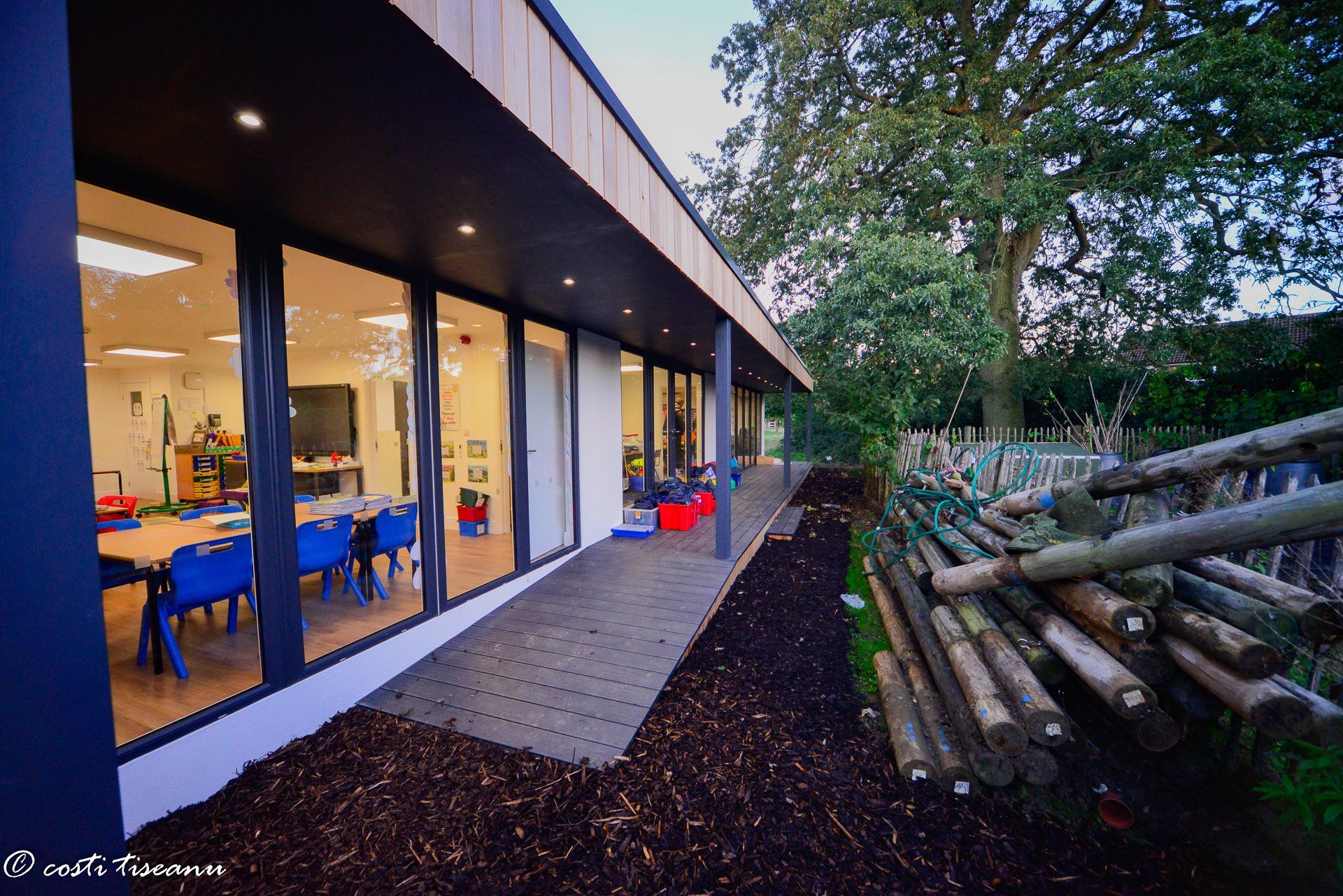 Glazed classroom doors overlooking an outdoor play area