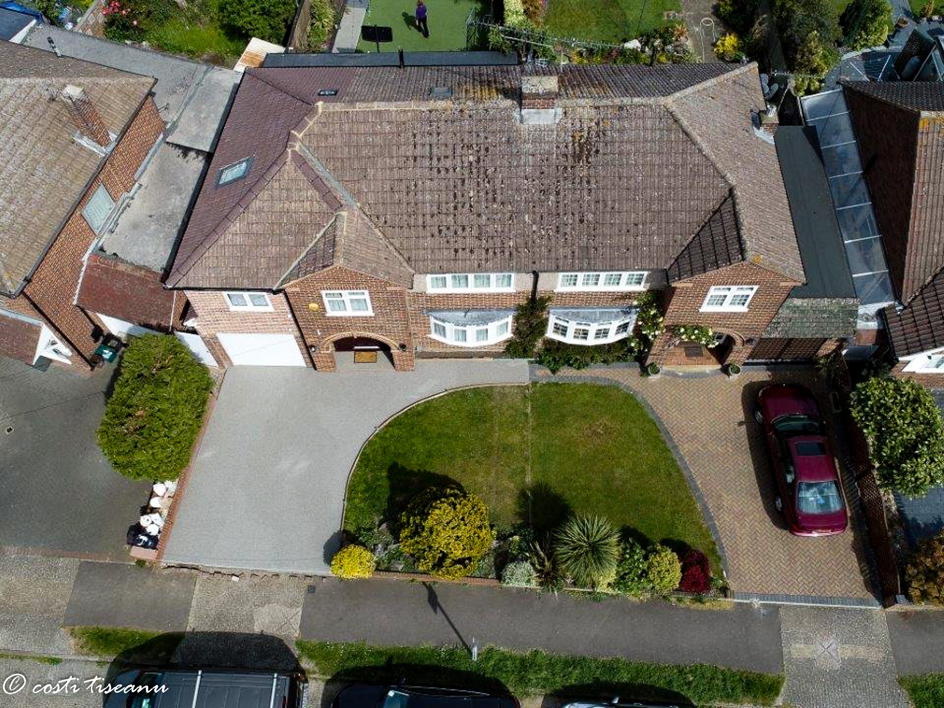 Aerial view of the completed roof and driveway