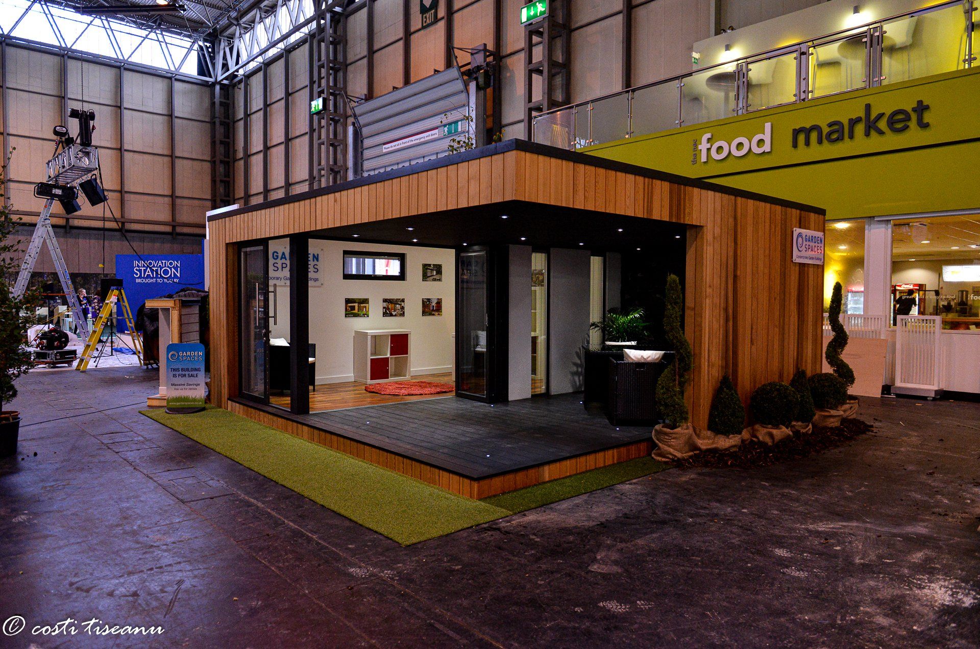 Garden building stand during exhibition-hall setup