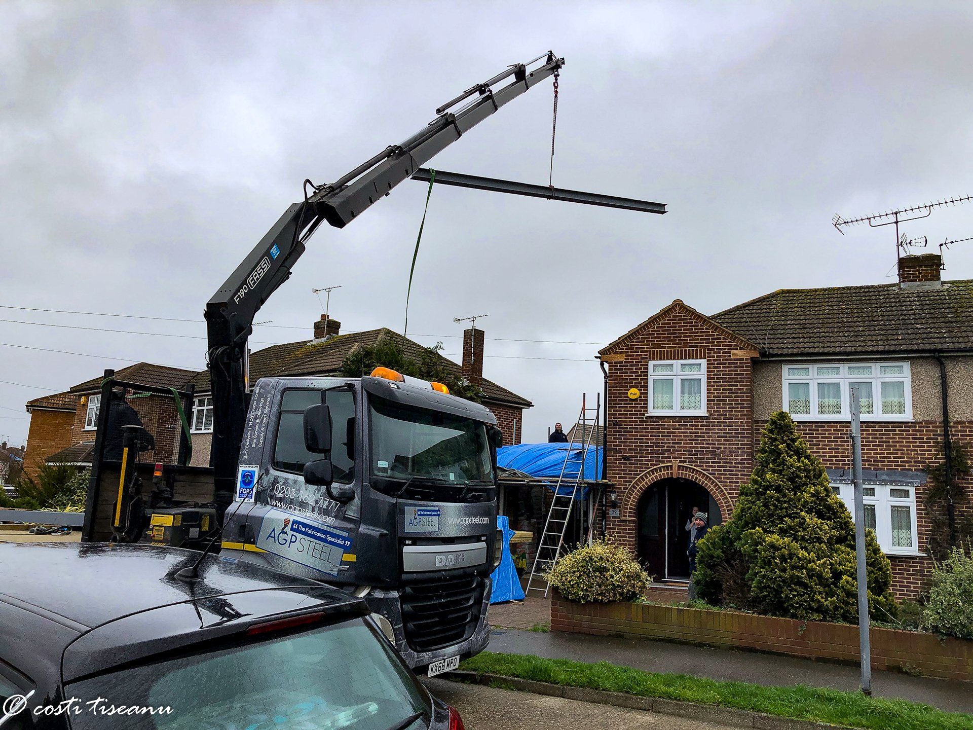 Lifting equipment on site during house extension works