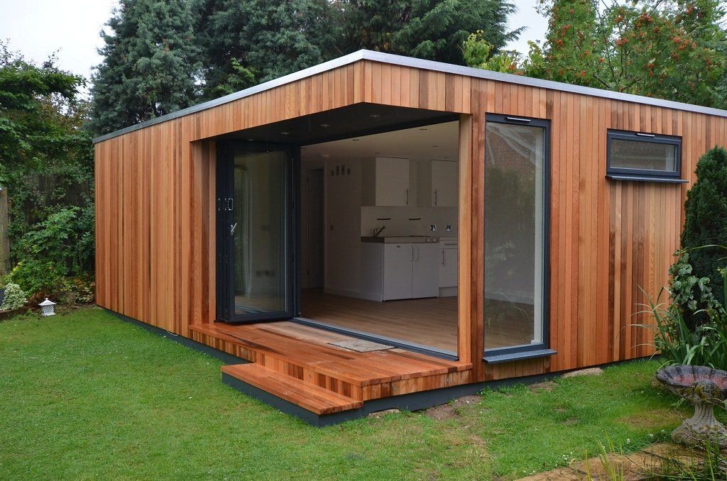 Red cedar garden room constructed with SIP panels, showcasing a modern and sustainable design