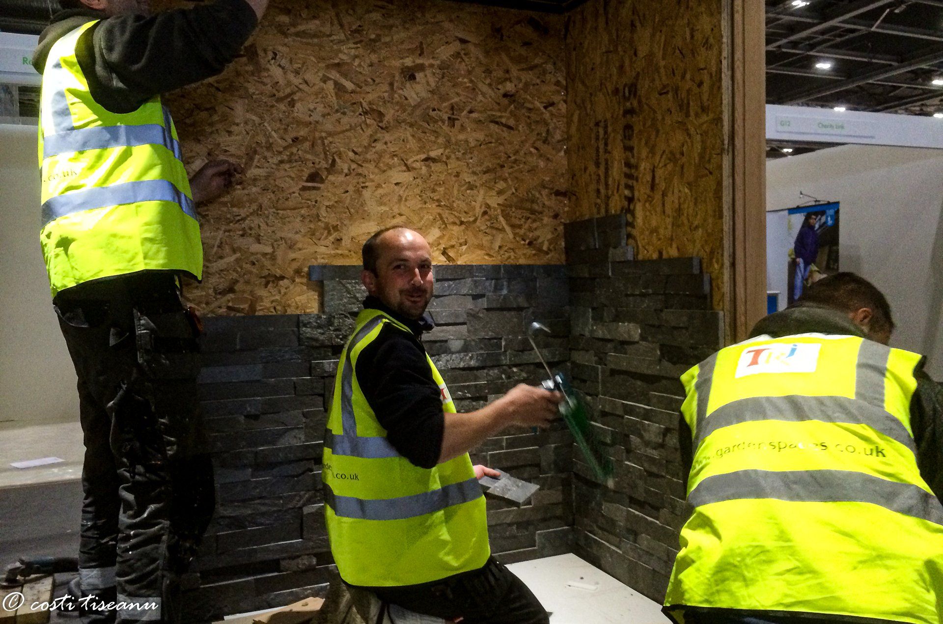 Installation team working inside the garden building