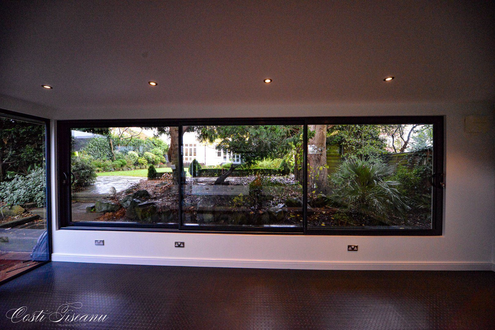 Open garden studio with a wide picture window