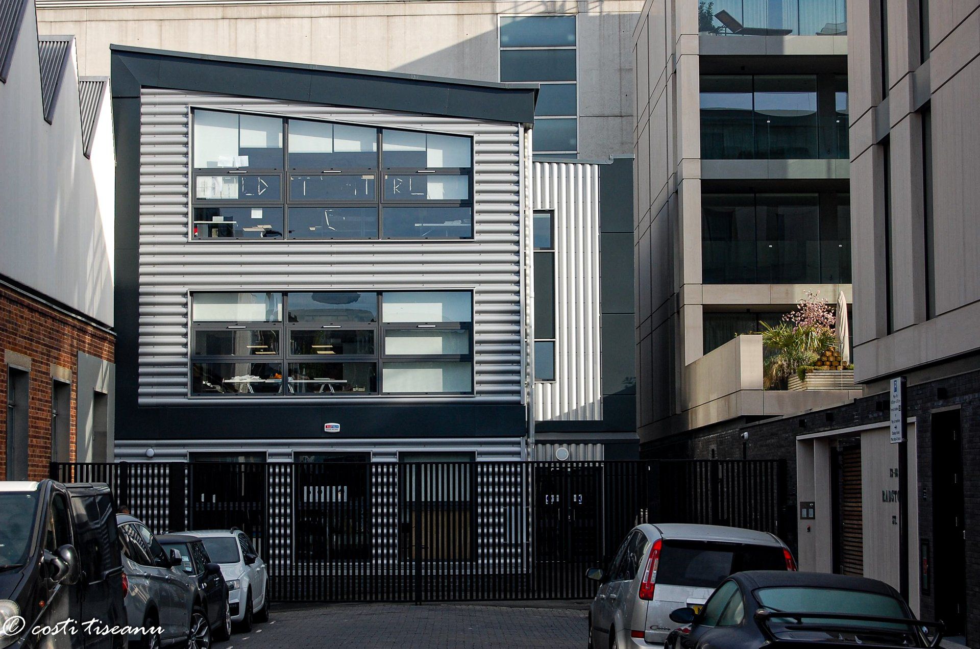 Completed commercial annexe with metal cladding and two rows of windows