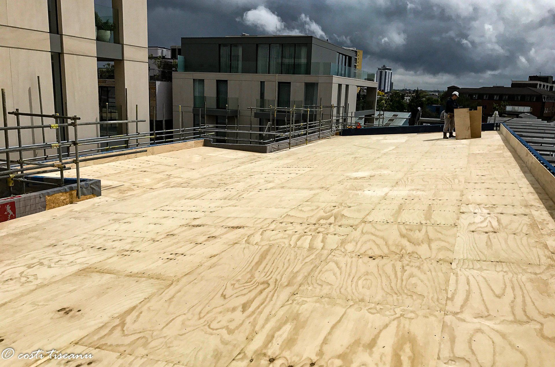 Panel deck and surrounding structures during construction