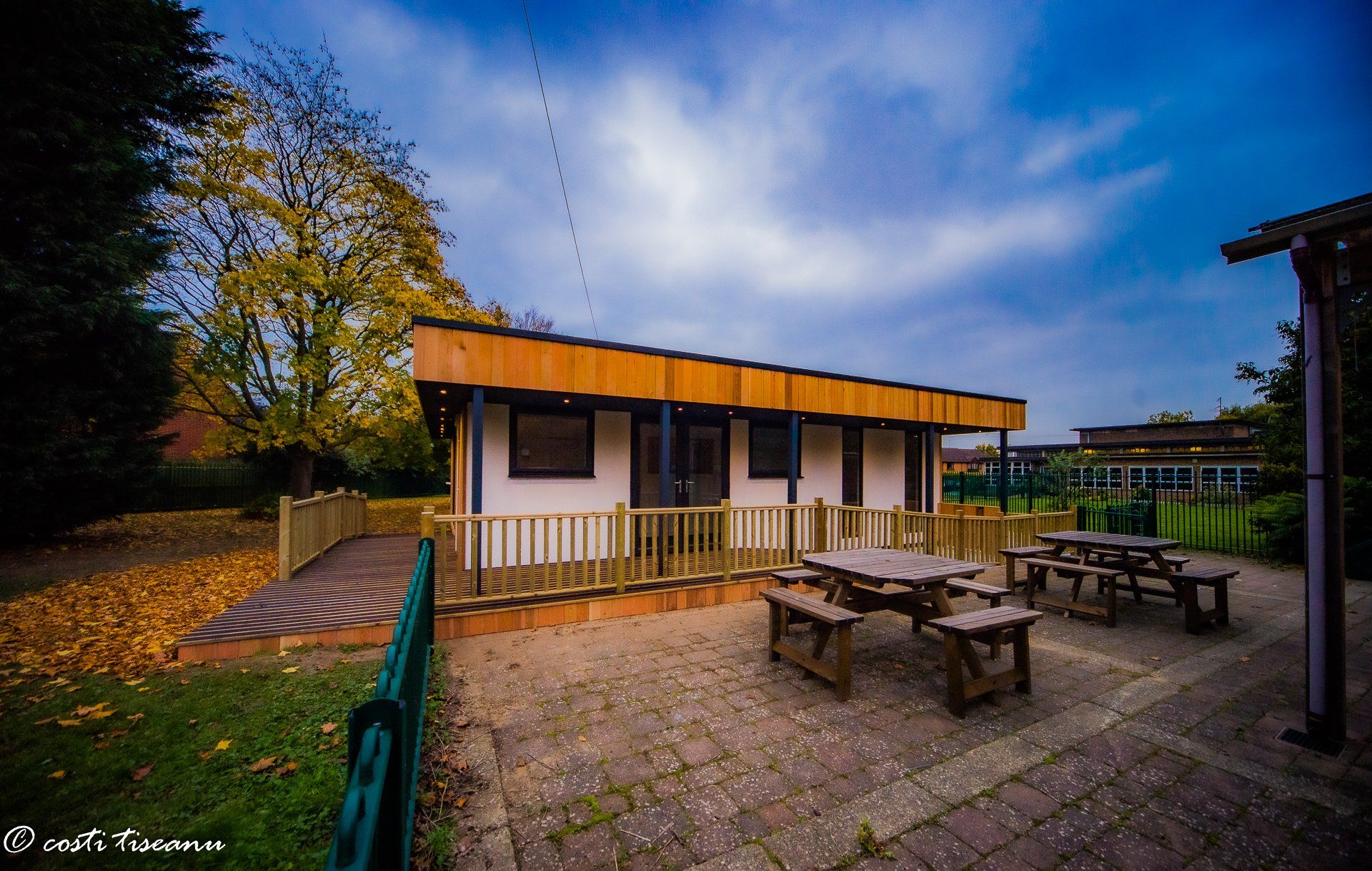 School building viewed across the outdoor learning area