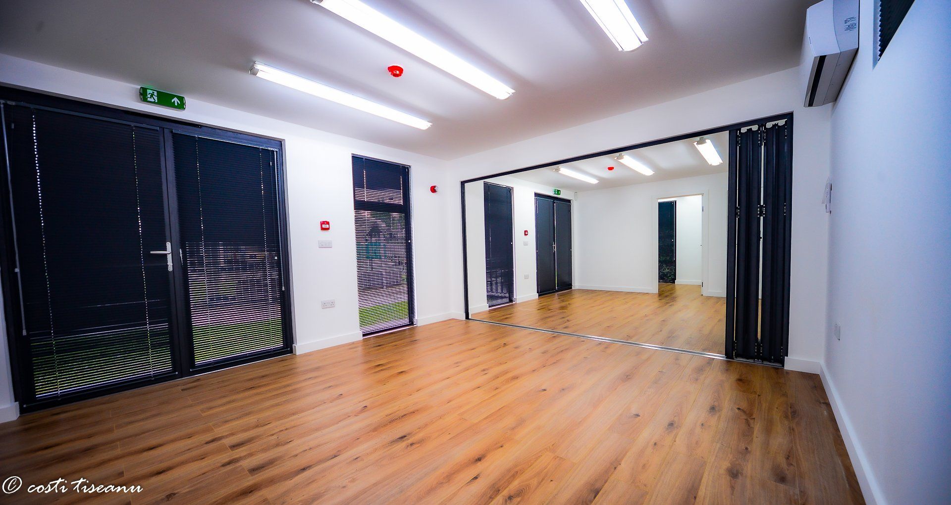 Large classroom interior with open connecting doors